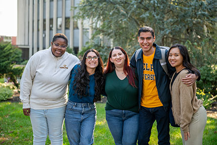 Students smiling. Links to Gifts That Pay You Income